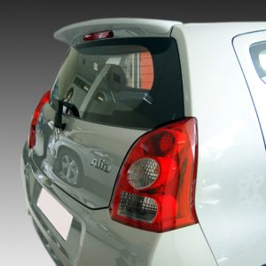 Rear view of a white hatchback car, showing the tail lights and rear window, with an 'Alto' badge on the trunk area.