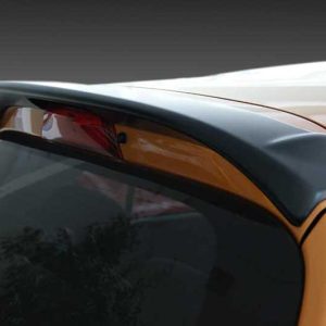 A-385_2jpg - OPSHOLDERS Close-up of a black rear spoiler mounted on an orange car (hatchback).