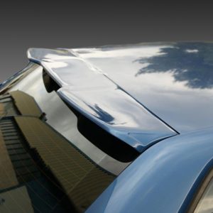 Blue car with a dented rear hatch and warped trunk area, reflecting trees in the paint