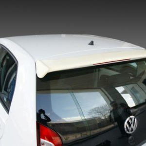 Rear view of a white VW hatchback with a small roof spoiler, photographed from above