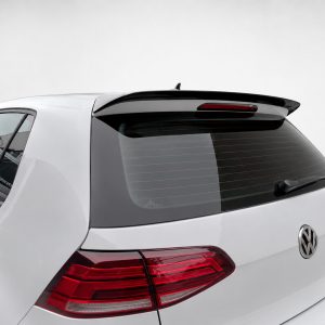A-403_4jpg - OPSHOLDERS Rear three-quarter view of a white Volkswagen SUV with a rear spoiler and tinted rear window.