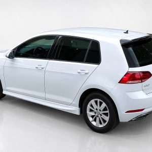 A-403_5jpg - OPSHOLDERS White Volkswagen Golf Estate, rear-left three-quarter view in a bright studio setting on a glossy floor