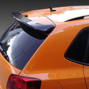 Orange hatchback car rear with a black spoiler, reflected sky in the rear window.
