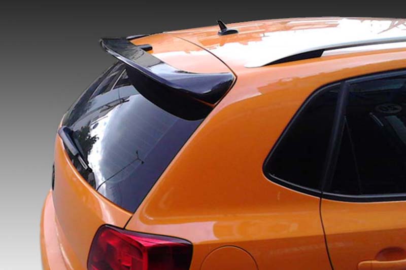 A-405_1jpg - OPSHOLDERS Orange hatchback car rear with a black spoiler, reflected sky in the rear window.