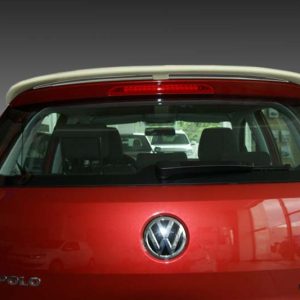 A-405_2jpg - OPSHOLDERS Rear view of a red Volkswagen Polo hatchback with VW emblem and TSI Bluemotion badge, shown in a showroom.