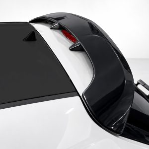 A-407_2jpg - OPSHOLDERS Close-up of a high-gloss black car roof, rear window, and spoiler with a wiper on the lower right edge.