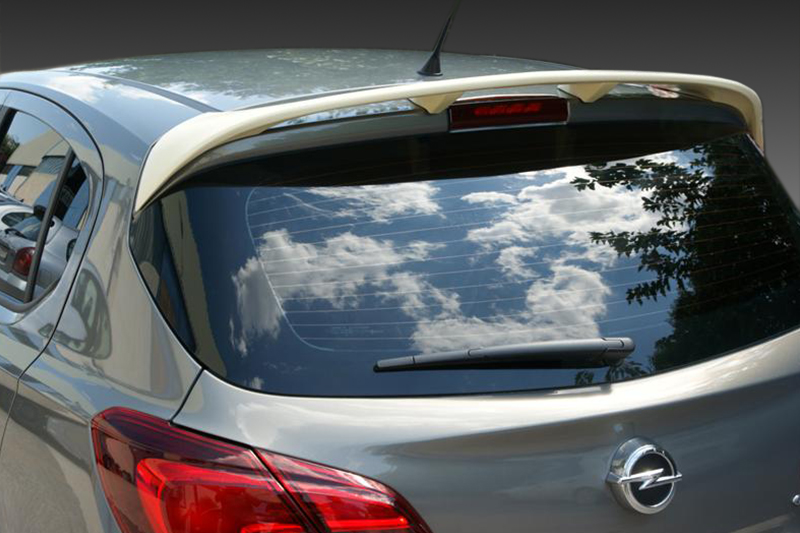 A-408_4jpg - OPSHOLDERS Rear view of a silver Opel hatchback, showing taillights, spoiler, and rear windshield wiper.