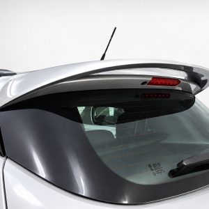 Rear view of a silver hatchback showing a raised spoiler, rear windshield with defroster lines, and the rear wiper at the bottom edge of the window