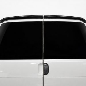 Front and rear of a white van with split rear doors and dark tinted windows.