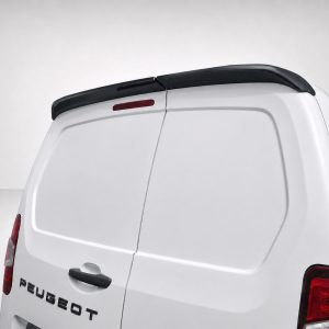 Rear view of a white Peugeot commercial van with a black roof spoiler and red taillight panels visible on the sides.