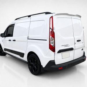 White Ford Transit Connect panel van seen from the rear-left, with black wheels and roof rails indoors.