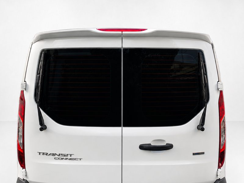 Rear view of a white Transit Connect van with split cargo doors and rear wipers visible.