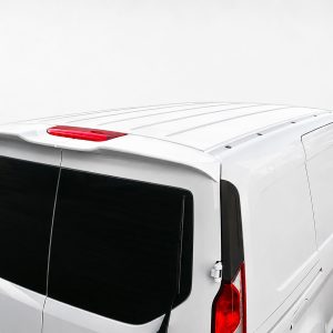 Top-down view of a white cargo van showing rear doors, tinted windows, roof rails, and a high-mounted brake light.