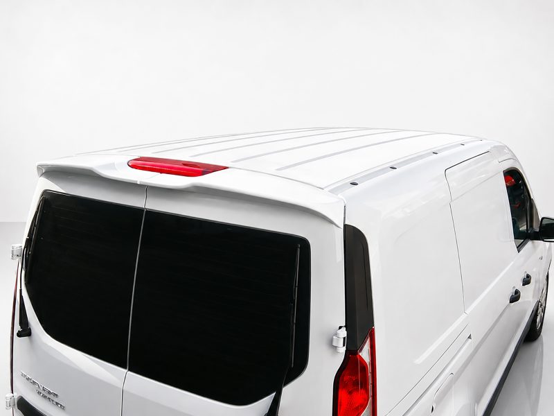 Top-down view of a white cargo van showing rear doors, tinted windows, roof rails, and a high-mounted brake light.
