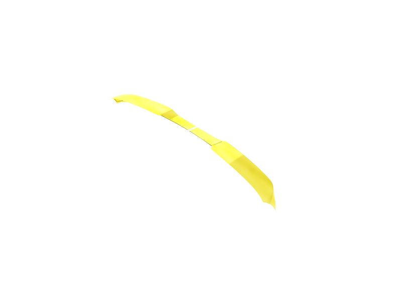 Yellow ribbon twisting in midair against a white background with soft shadows.