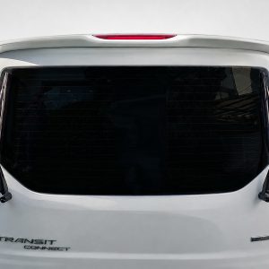 A-441_3jpg - OPSHOLDERS Rear view of a white Ford Transit Connect van with a large rear window and two wiper blades visible on the tailgate.