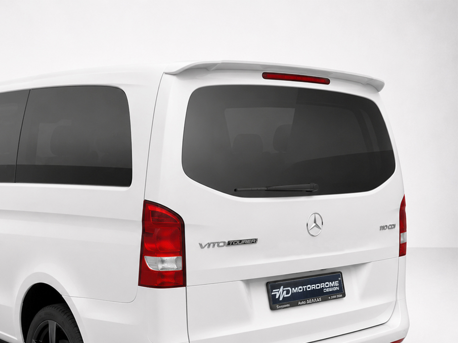 A-442_1jpg - OPSHOLDERS White Mercedes Vito Tourer rear three-quarter view with tinted windows and red tail lights