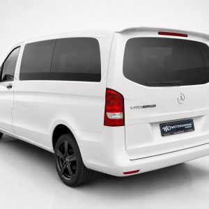 A-442_2jpg - OPSHOLDERS Rear and left-side view of a white Mercedes Vito Tourer van with dark windows and black wheels indoors.