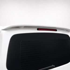 A-442_4jpg - OPSHOLDERS White SUV rear with a small spoiler on the roofline above the rear window and a red brake light integrated into the spoiler.