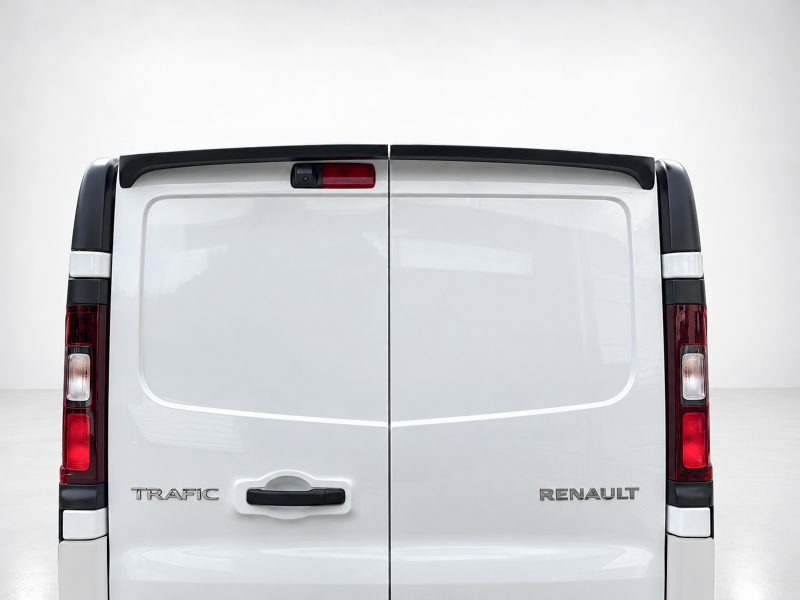 Rear view of a white Renault Trafic van with split rear doors, showing red taillights and Renault badge on each door.