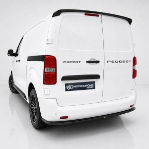 Rear view of a white Peugeot Expert cargo van with dealership-style 'MotorDrome Design' plate on the bumper area