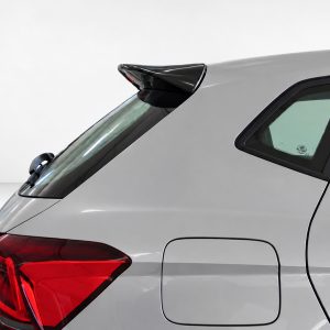 A-451_4jpg - OPSHOLDERS Silver car rear quarter with a small black roof spoiler, red tail light, and visible rear window contours.