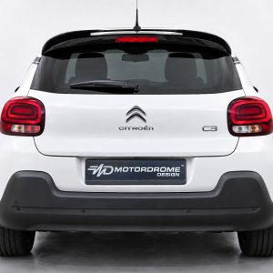 Rear view of a white Citroën C3 hatchback with red taillights and Motordrome Design plate on the bumper.