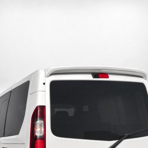 A-455_4jpg - OPSHOLDERS Rear view of a white cargo van showing the large rear window, wiper, and red tail lights in a neutral backdrop.