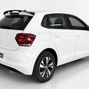 A-457_2jpg - OPSHOLDERS White compact hatchback photographed from the rear-right three-quarter angle in a studio.