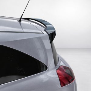 A-459_3jpg - OPSHOLDERS Rear view of a silver hatchback showing the raised spoiler above the rear window and an antenna on the roof rail
