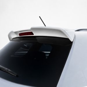 Rear view of a white car showing a spoiler, red brake light, antenna, and dark rear window/s, taken from above left side