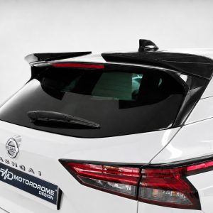A-471_2jpg - OPSHOLDERS Rear view of a white Nissan Qashqai SUV with a dark rear window, roof spoiler, and wiper visible on the tailgate plate area
