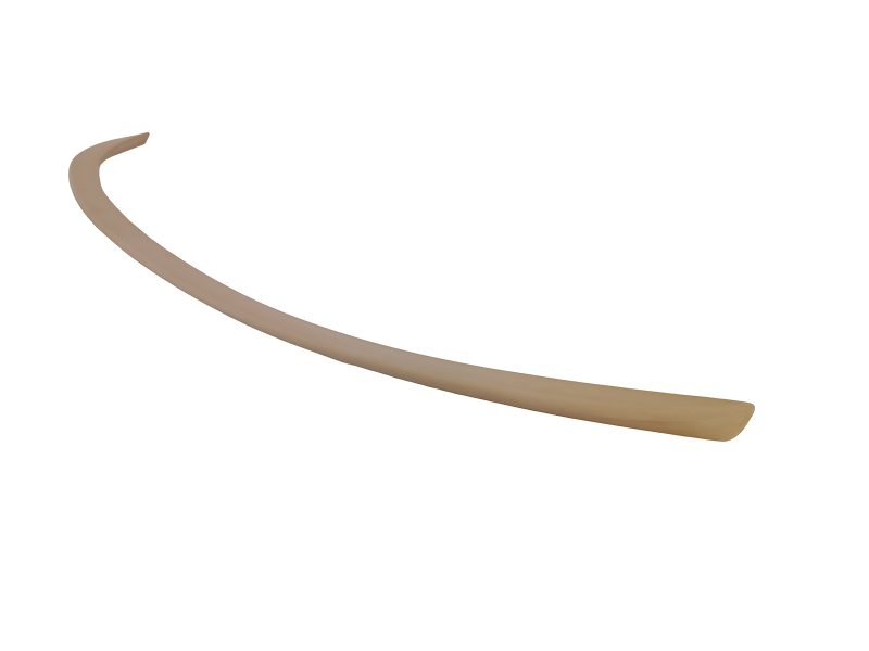 Curved beige plastic strip with tapered ends, bending in a wide arc across the image