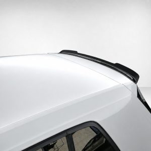 White car roof with black roof rack rails seen from above, showing sleek aerodynamic design
