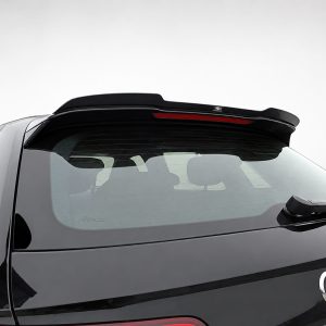 Rear of a black Audi SUV with a raised rooftop spoiler and rear wiper.