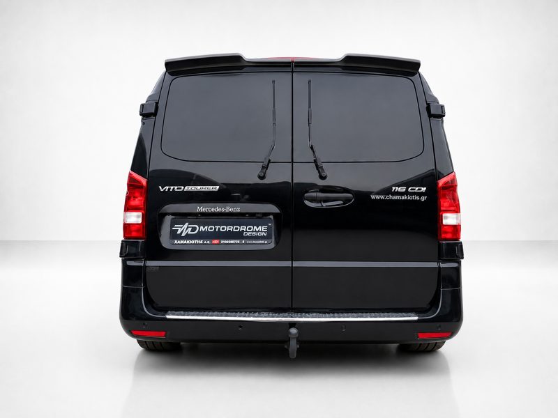 Rear view of a black Mercedes-Benz Vito Tourer van with two back doors, wipers, and a branded rear plate area.