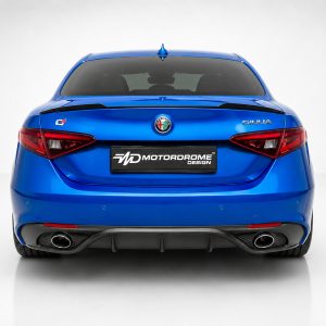 Rear view of a blue Alfa Romeo Giulia with a black Motordrome Design plate on a plain backdrop.