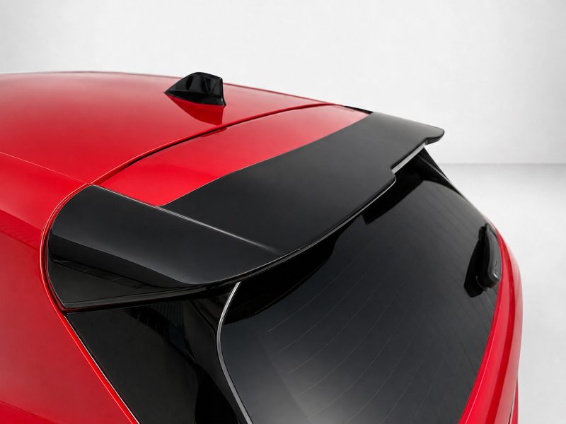 A-492_3jpg - OPSHOLDERS Red car rear deck with a black spoiler and curved rear window, viewed from above (top-down perspective)