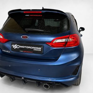 A-493_2jpg - OPSHOLDERS Blue Ford hatchback rear view with Motordrome Design plate and red taillights.