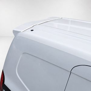 Close-up of the back of a white pickup truck, showing the tonneau cover over the bed and part of the tail light