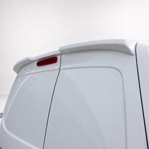 Rear section of a white van with a small roof spoiler and red tail light along the back edge.