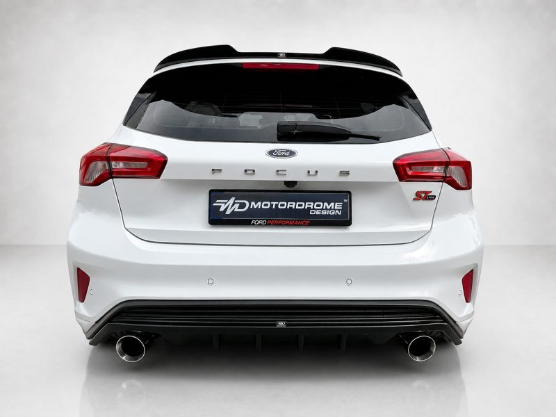 A-497_3jpg - OPSHOLDERS Rear view of a white Ford Focus ST-Line hatchback with red taillights and a Motordrome Design plate on the bumper.