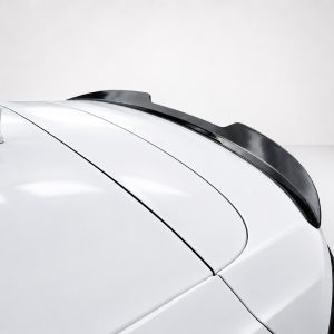 A-497_4jpg - OPSHOLDERS White car with a black rear spoiler viewed from above for a close-up detail focus on the spoiler