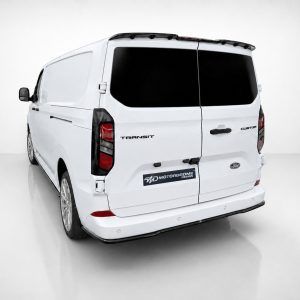 White Ford Transit van shown from the rear-left in a bright studio, with dark rear windows and a black license plate area reading 'MotorDrome Design' (concept/custom van).