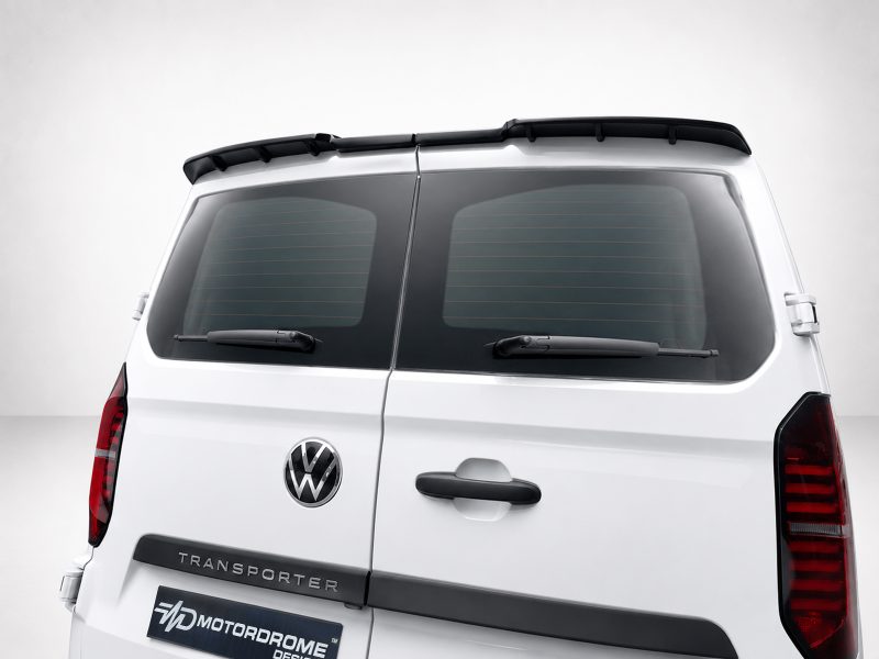 Rear view of a white VW Transporter van with split rear doors, rear windows, wipers, and roof rails.