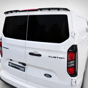 Rear view of a white Ford Transit Custom van with dark rear windows and 'Custom' badge visible on the tail door.