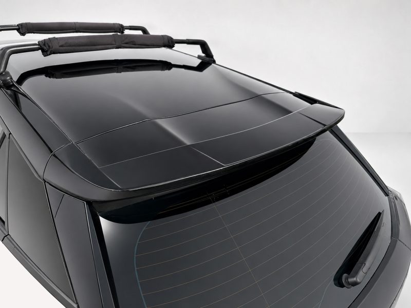A-513_3jpg - OPSHOLDERS Close-up of a black car roof with folded roof rack crossbars mounted on top and glossy finish.