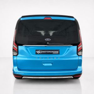 A-516_3jpg - OPSHOLDERS Rear view of a bright blue Ford Tourneo van with a Motordrome Design logo on the tailgate.