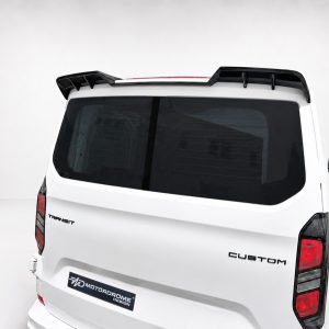 A-517_5jpg - OPSHOLDERS Rear view of a white Ford Transit Custom van with a black roof spoiler and tinted rear window