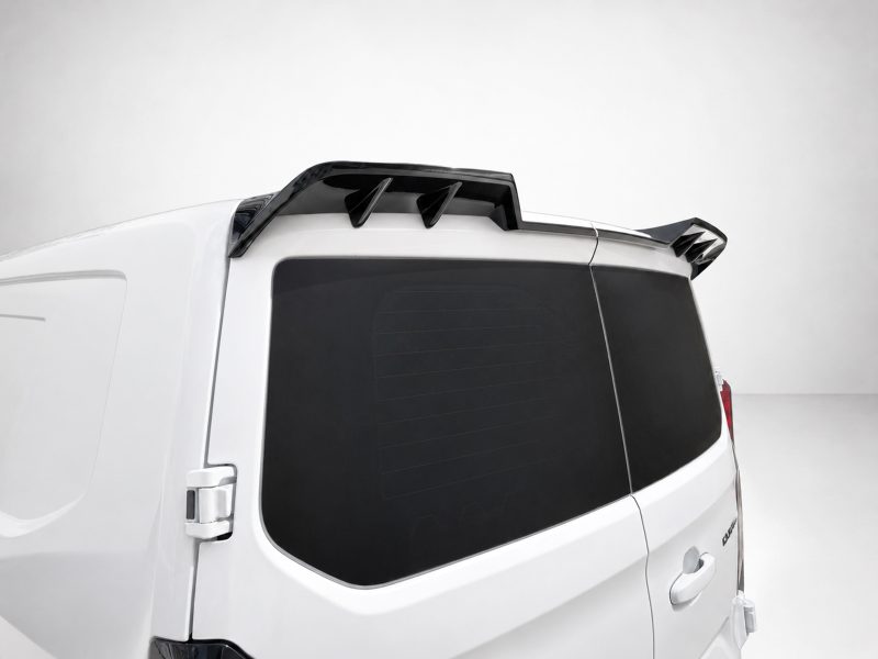 White cargo van seen from behind with a black aerodynamic roof spoiler above the rear window and dark-tinted rear window